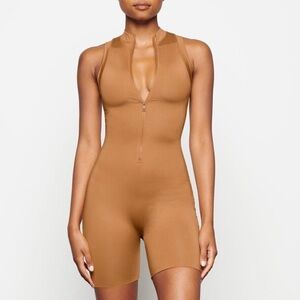 Skims Swim Mock Neck Sleeveless Zippered Mid Thigh One Piece Romper Almond Brown